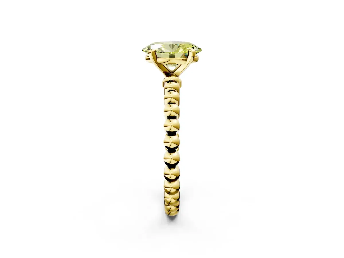 Fancy Yellow Oval Cut Diamond Solitaire Ring with Beaded Band and Prong Setting Yellow gold