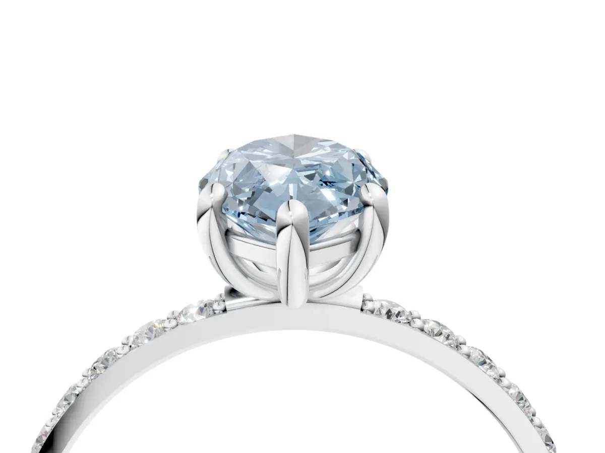 Fancy Blue Marquise Cut Diamond Solitaire Ring with Round Pavé Band and Prong Setting Silver