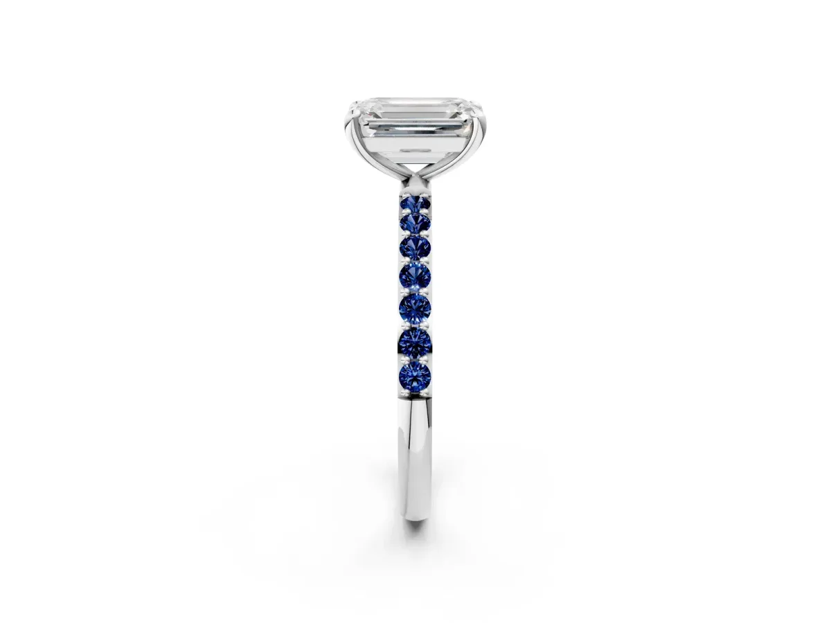 Emerald Cut Diamond Solitaire Ring with Round Blue Sapphire Pavé Band and Prong Setting Silver
