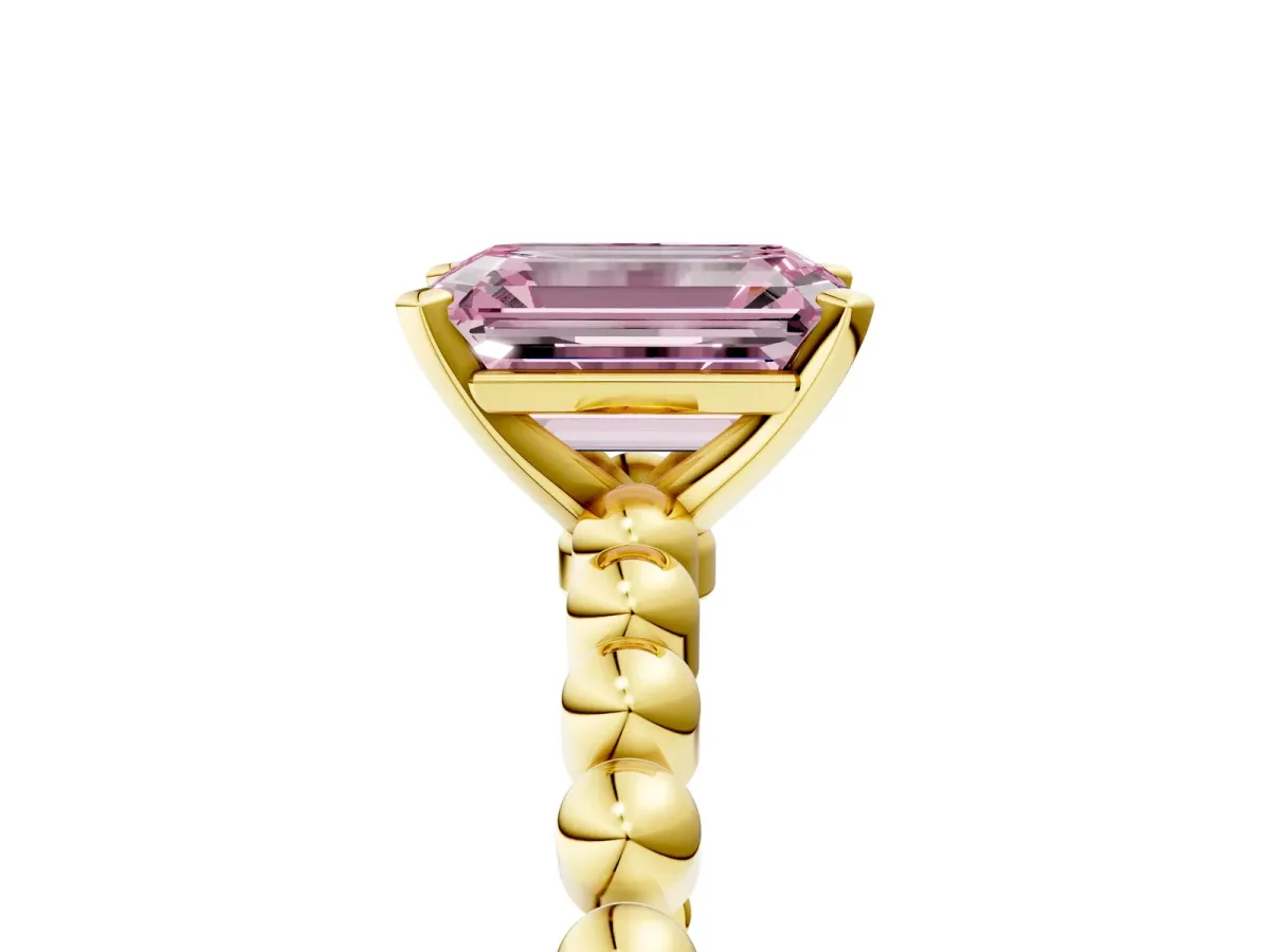 Fancy Pink Emerald Cut Diamond Solitaire Ring with Beaded Band and Prong Setting Yellow gold