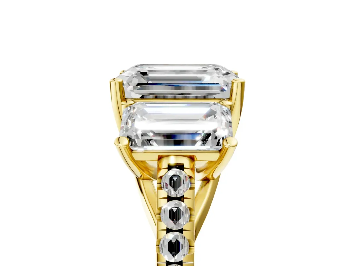 Fancy Blue Three-Stone Emerald Cut Diamond Ring with Round Pavé Band and Prong Setting Yellow gold
