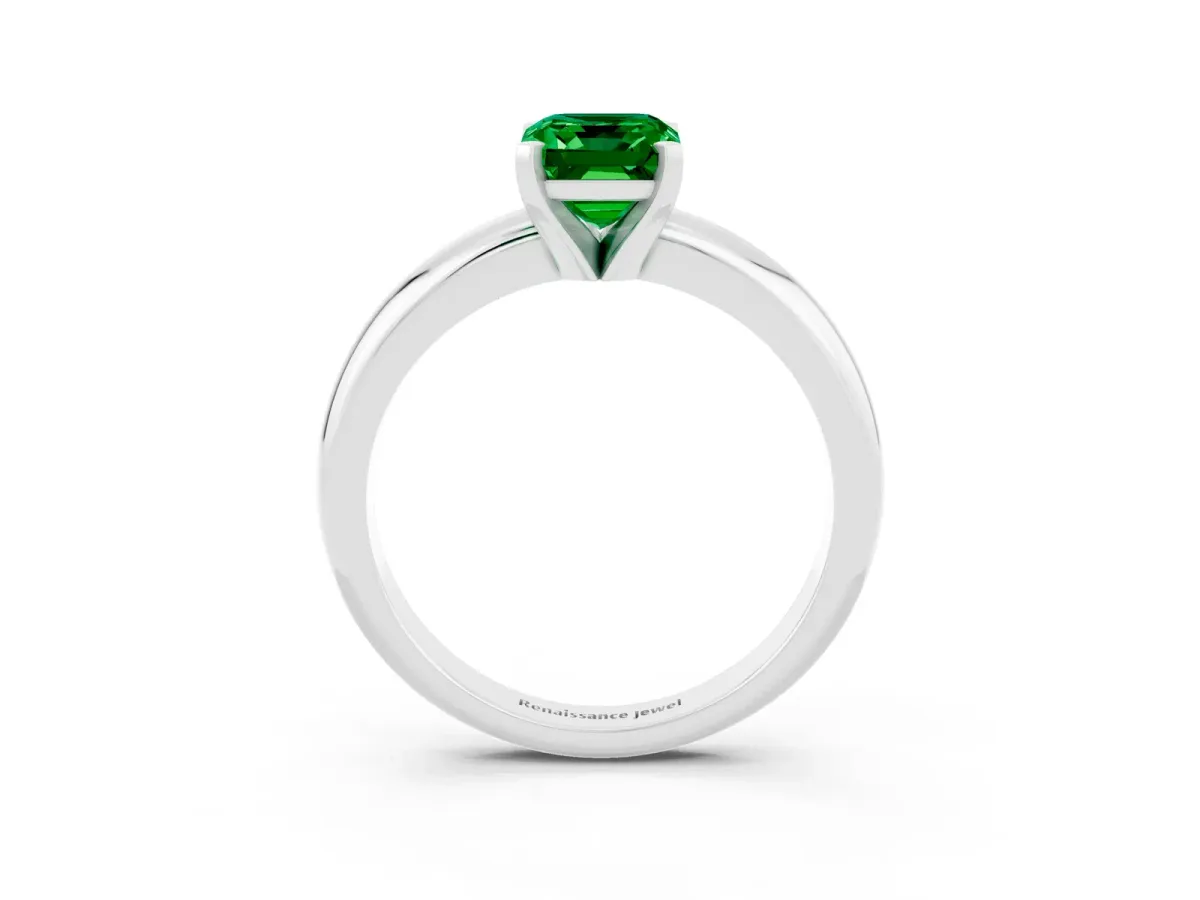 Emerald Cut Emerald Solitaire Engagement Ring with Round Band and Four-Prong Setting Platinum