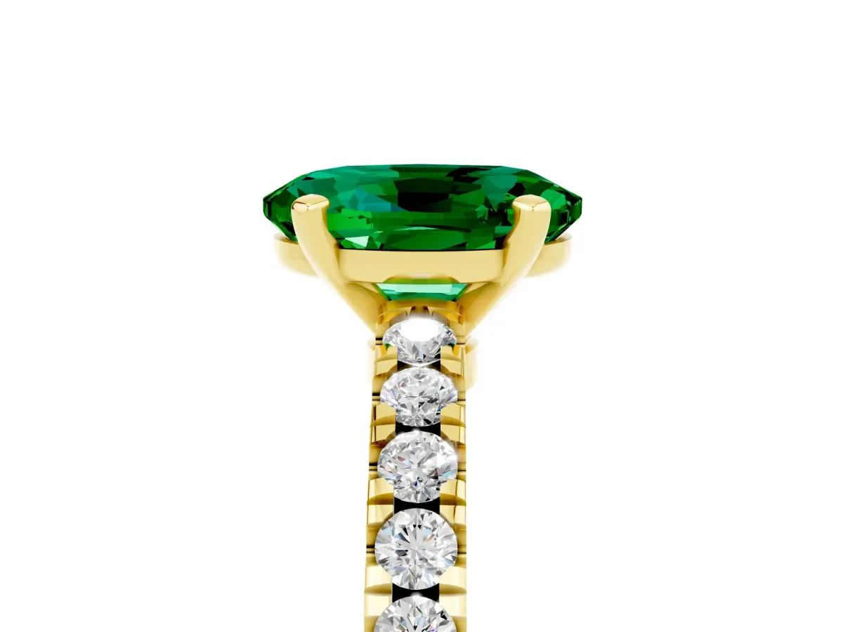 Oval Cut Solitaire Emerald with Pavé Band and Four-Prong Setting Yellow gold