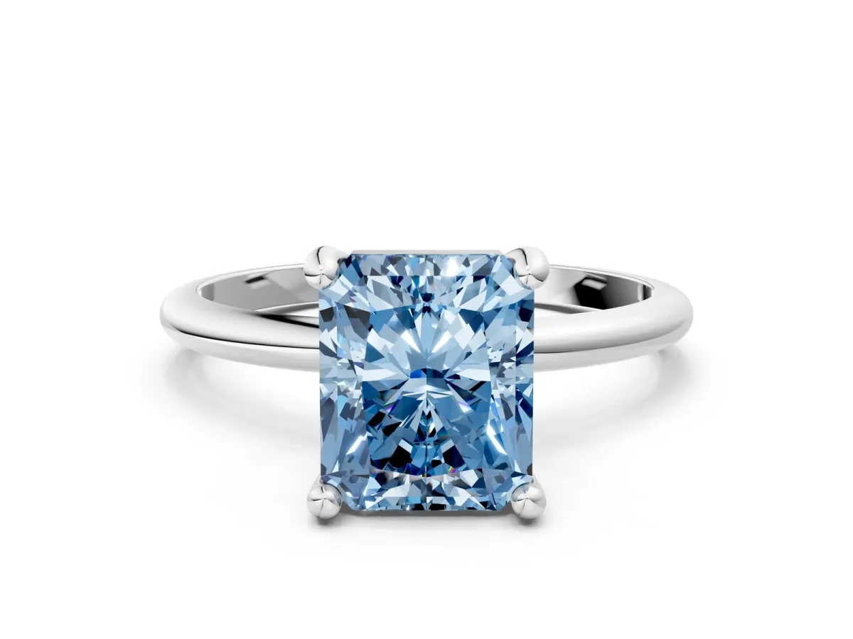 Fancy Blue Radiant Cut Solitaire Diamond Ring with 4-Prong Setting on a Classic Band White gold