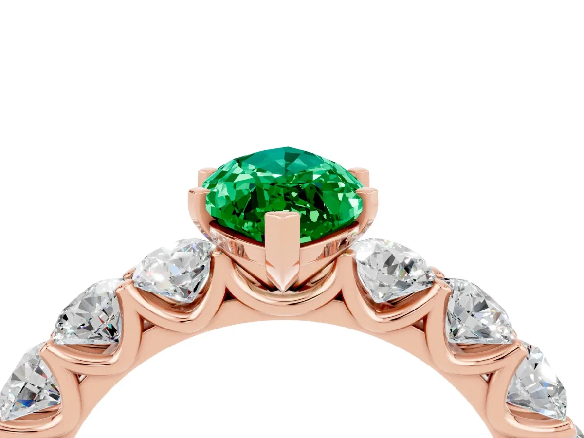 Marquise Cut Emerald Prong Setting with Side Stones on a Pave Band Rose gold