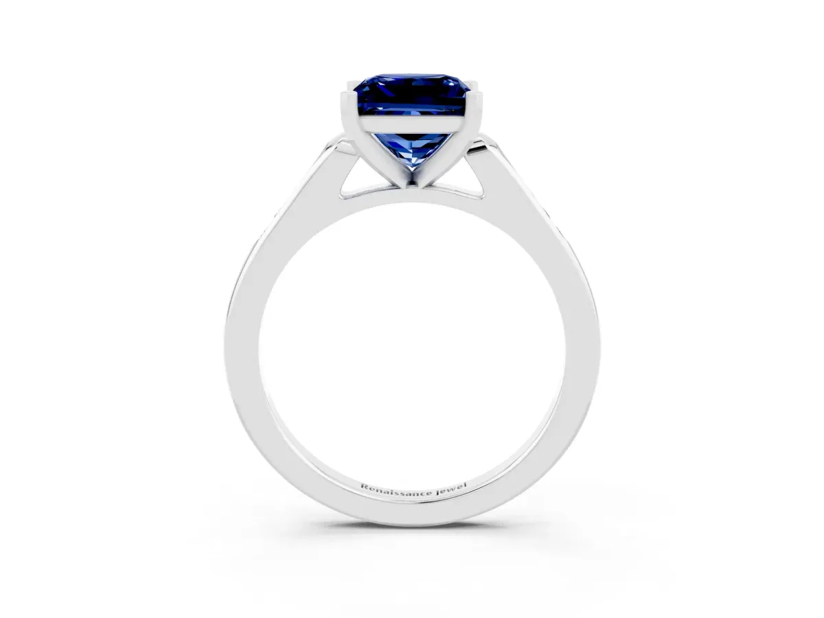 Princess Cut Blue Sapphire Solitaire Ring with Channel Set Round Band and Prong Setting Silver