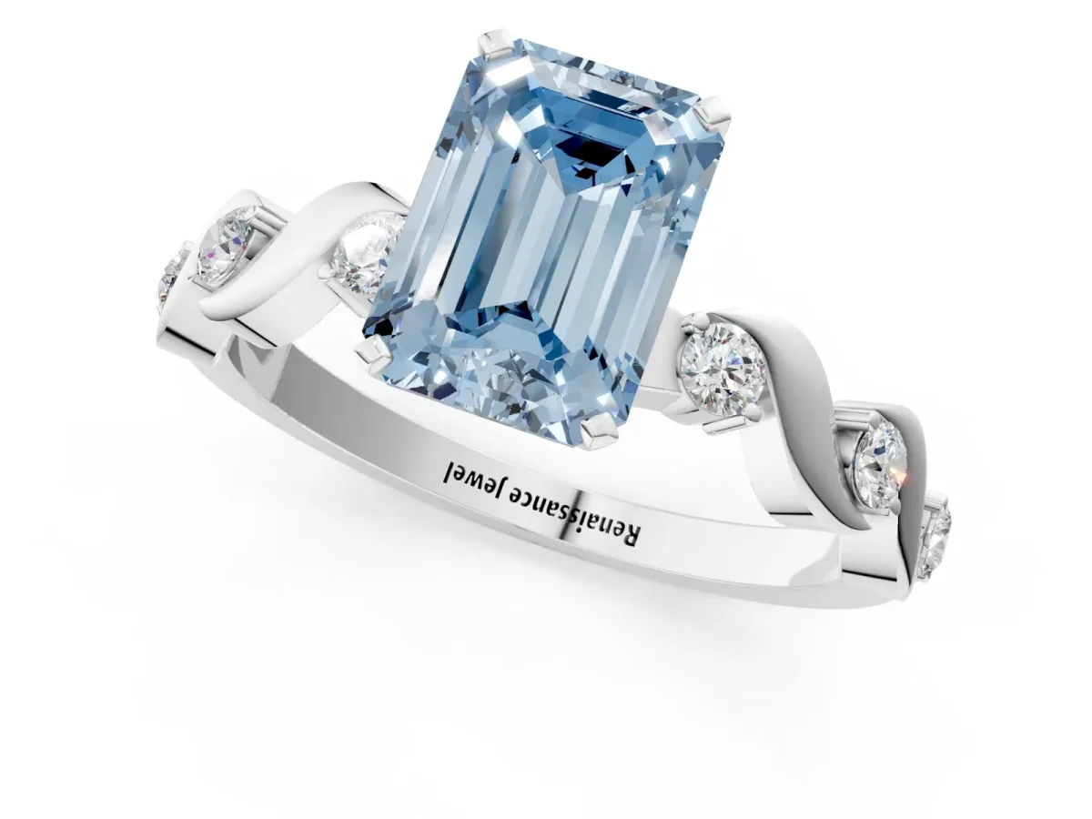 Fancy Blue Emerald Cut Diamond Solitaire Twisted Band with Round Accents and Prong Setting Silver