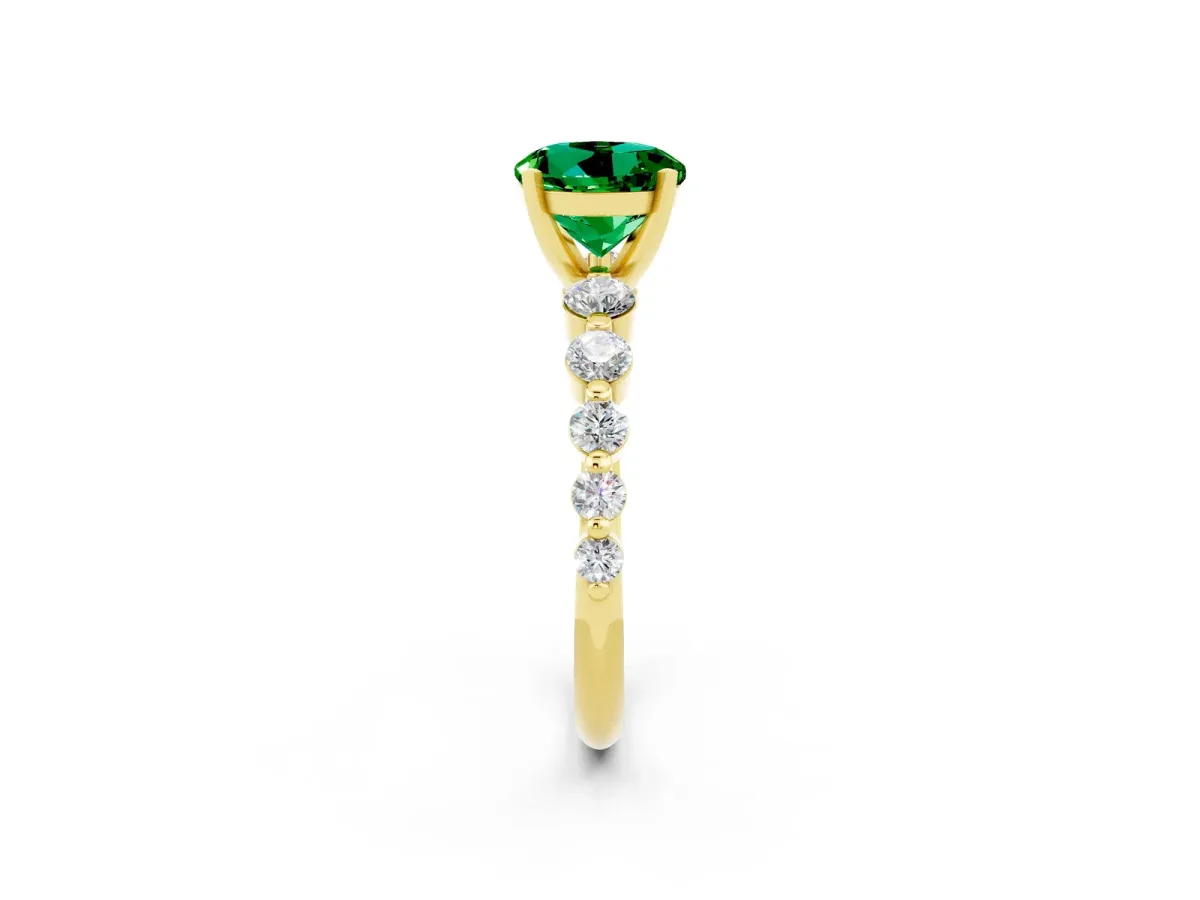 Round Cut Solitaire Emerald Ring with Pave Band and Four-Prong Setting Yellow gold