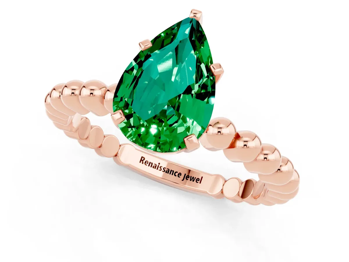 Pear Cut Emerald Solitaire Ring with Beaded Band and Prong Setting Rose gold