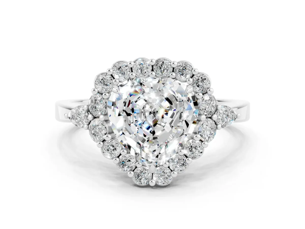Heart Cut Moissanite Halo Ring with Pear Side Stones and Prong Setting Silver