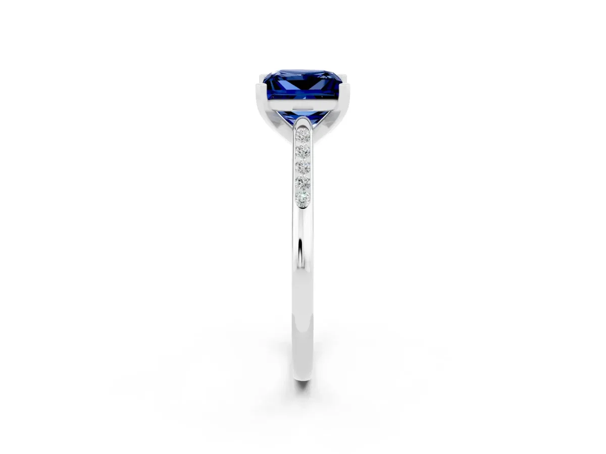 Princess Cut Blue Sapphire Solitaire Ring with Channel Set Round Band and Prong Setting Silver