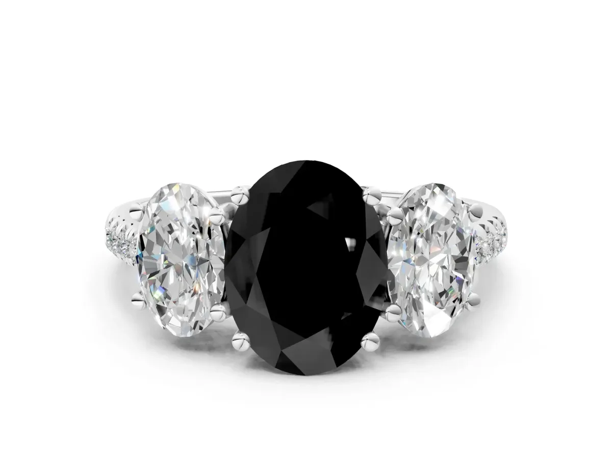 Fancy Black Three-Stone Oval Cut Diamond Ring with Round Pavé Band and Prong Setting Platinum