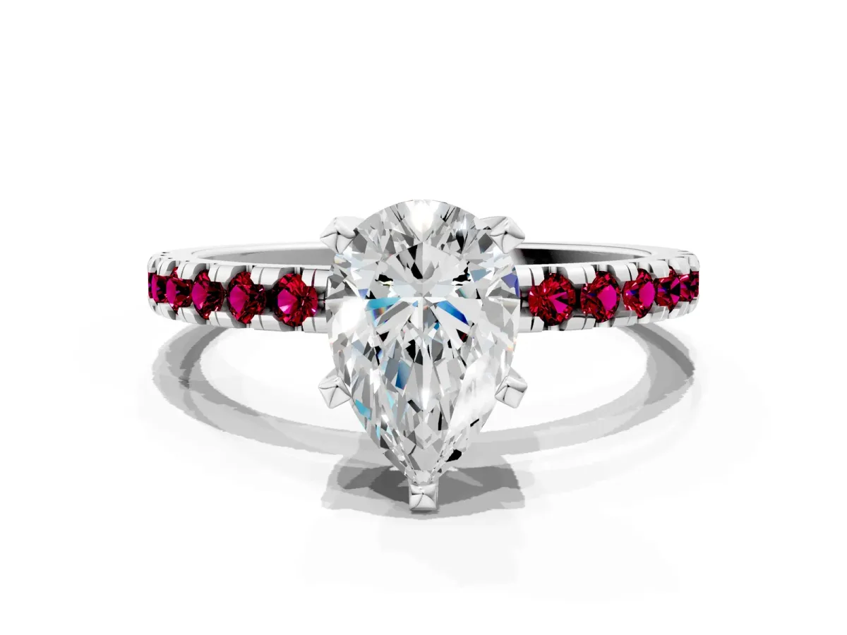 Pear Cut Diamond Solitaire Ring with Round Garnet Pavé Band and Four-Prong Setting Silver