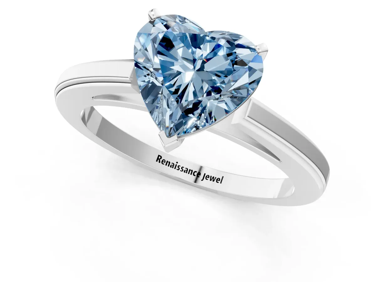 Fancy Blue Heart Cut Solitaire Diamond Ring with Four-Prong Setting and Classic Band Platinum