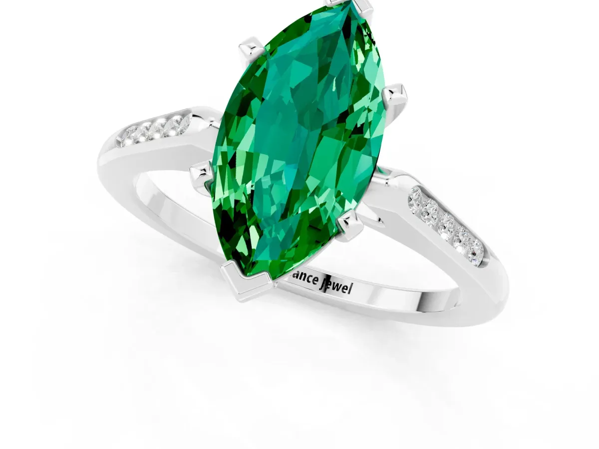 Marquise Cut Emerald Solitaire Ring with Channel Set Round Band and Prong Setting Silver