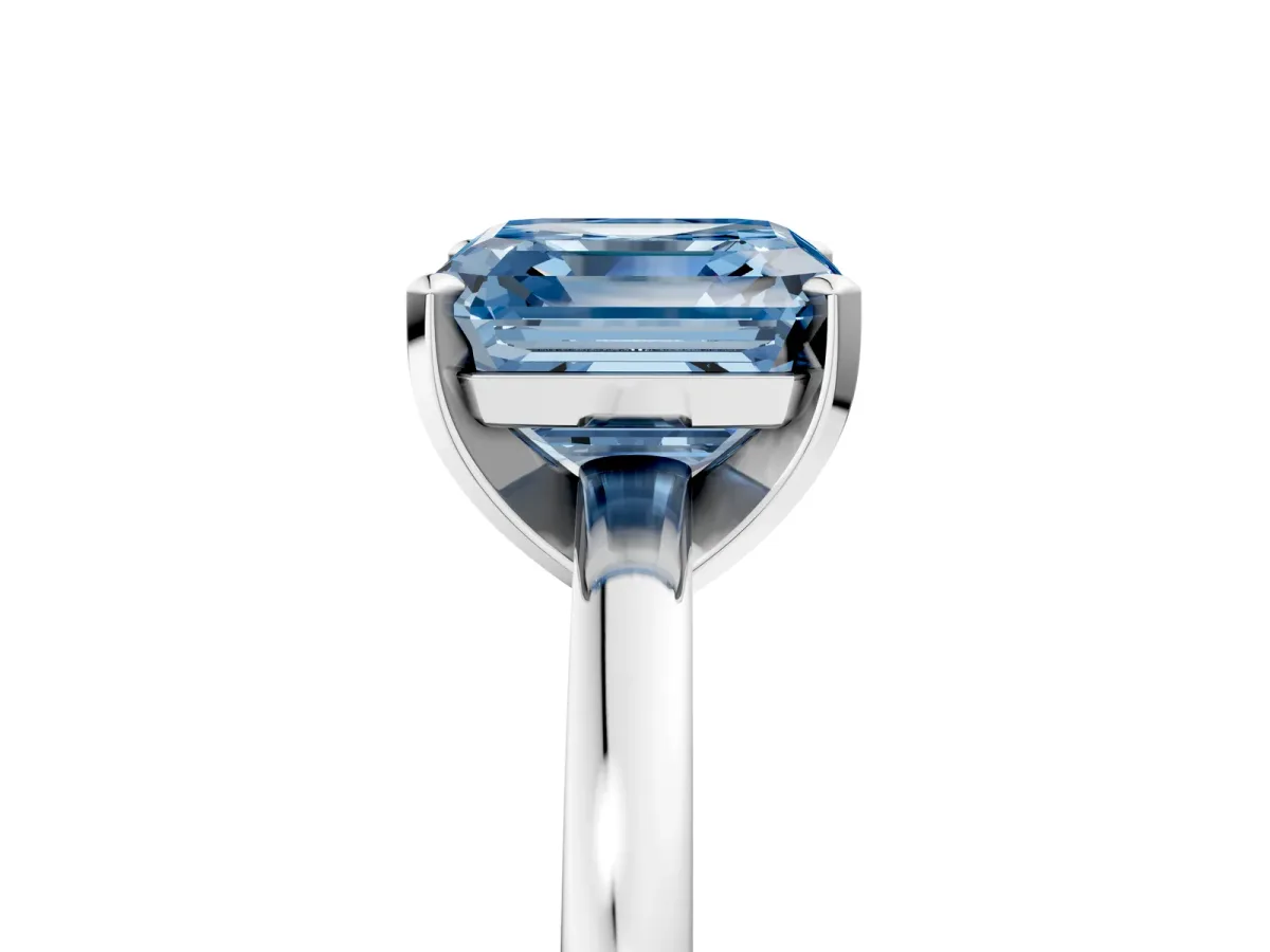Fancy Blue Asscher Cut Solitaire Diamond Engagement Ring with Four-Prong Setting on a Classic Band Platinum