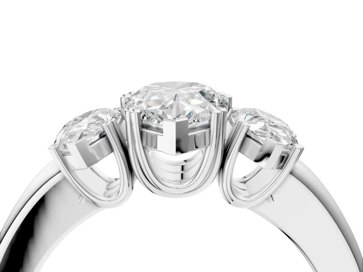 Three-Stone Pear Cut Cut Diamond Ring with Channel Set Band and Four-Prong Setting White gold