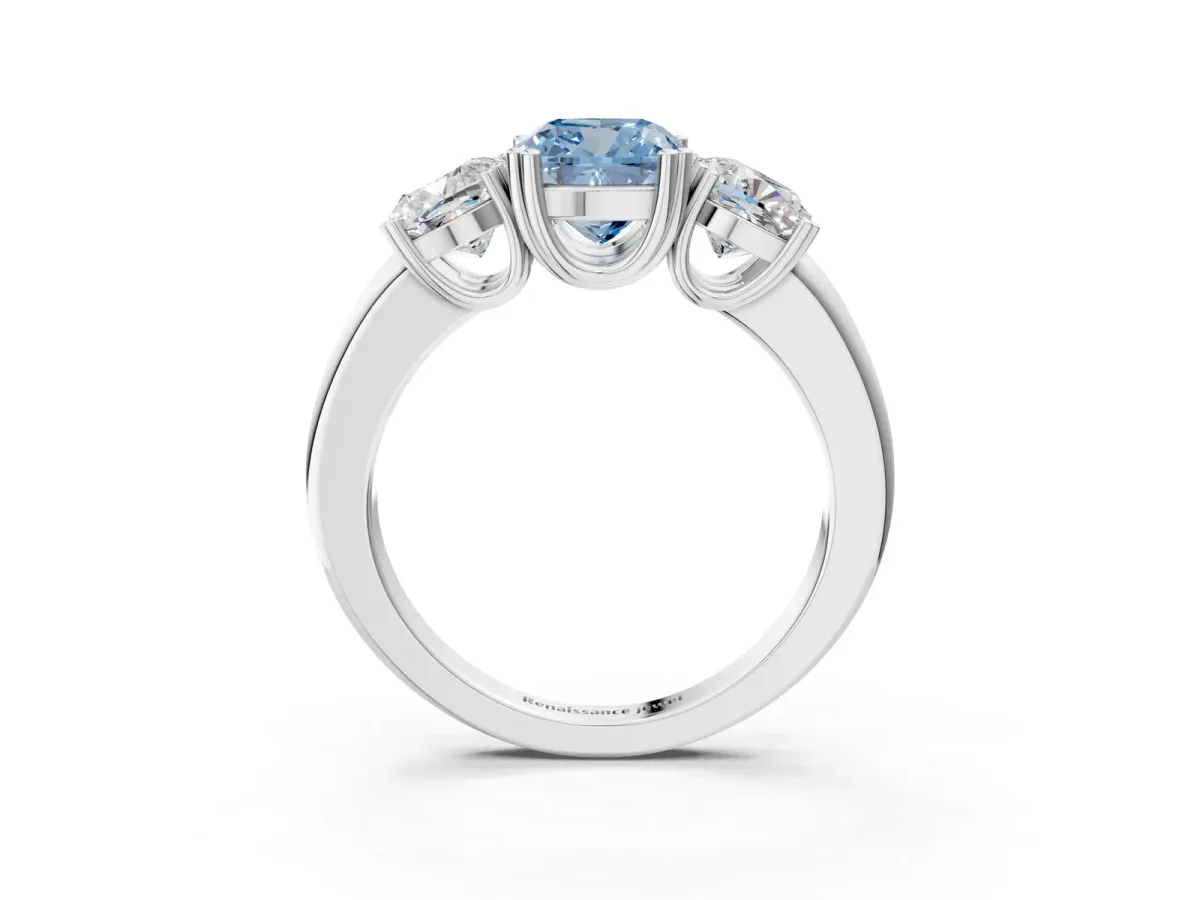 Fancy Blue Three-Stone Cushion Cut Cut Diamond Ring with Channel Set Band and Four-Prong Setting Silver