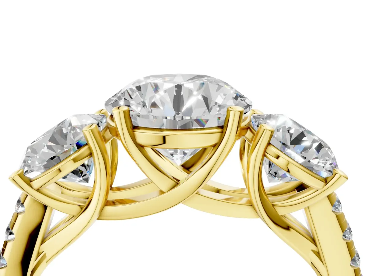 Three-Stone Round Cut Diamond Ring with Round Pavé Band and Prong Setting Yellow gold