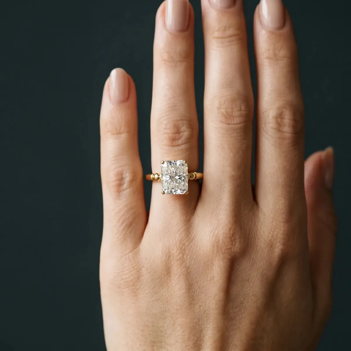 Radiant Cut Solitaire Beaded Band with Four-Prong Setting Yellow gold
