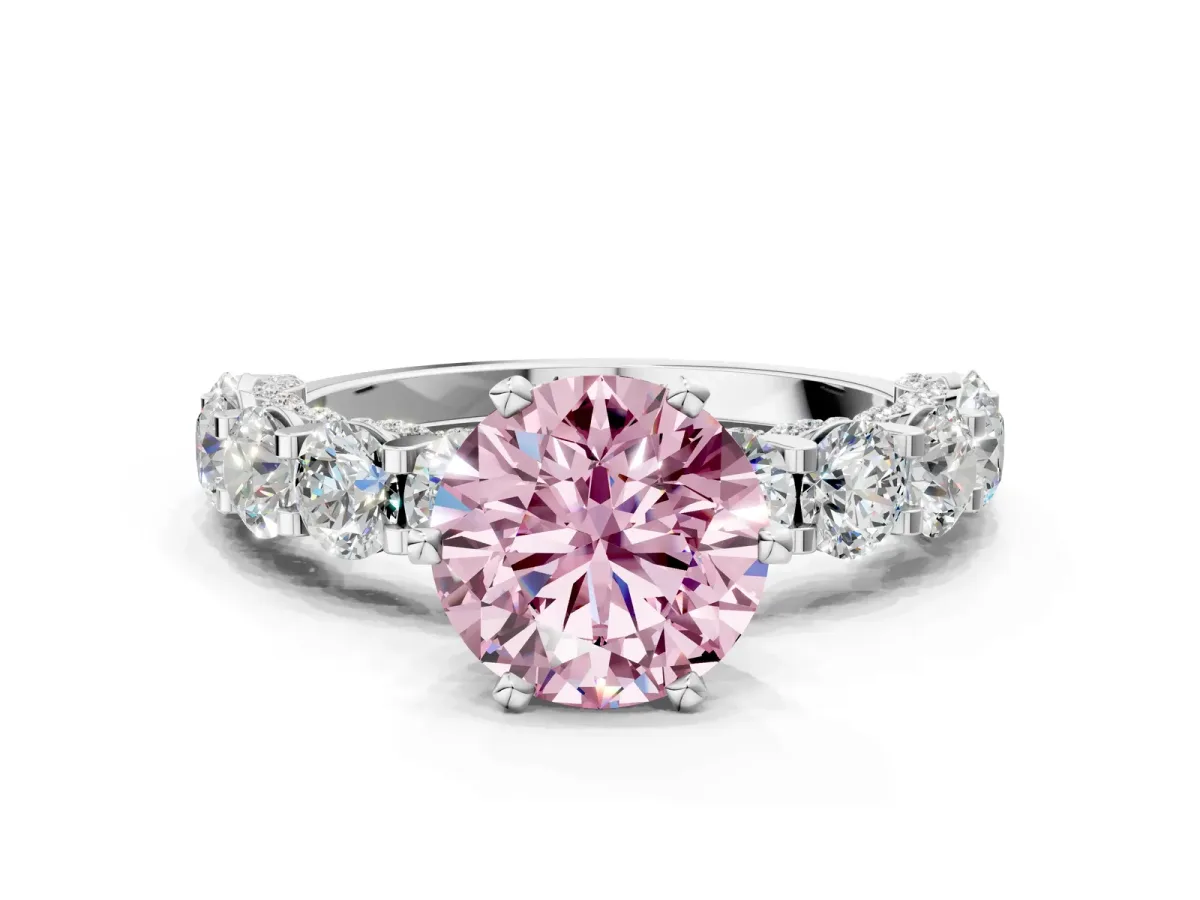 Fancy Pink Round Cut Diamond Side Stone Engagement Ring with Four-Prong Setting Silver