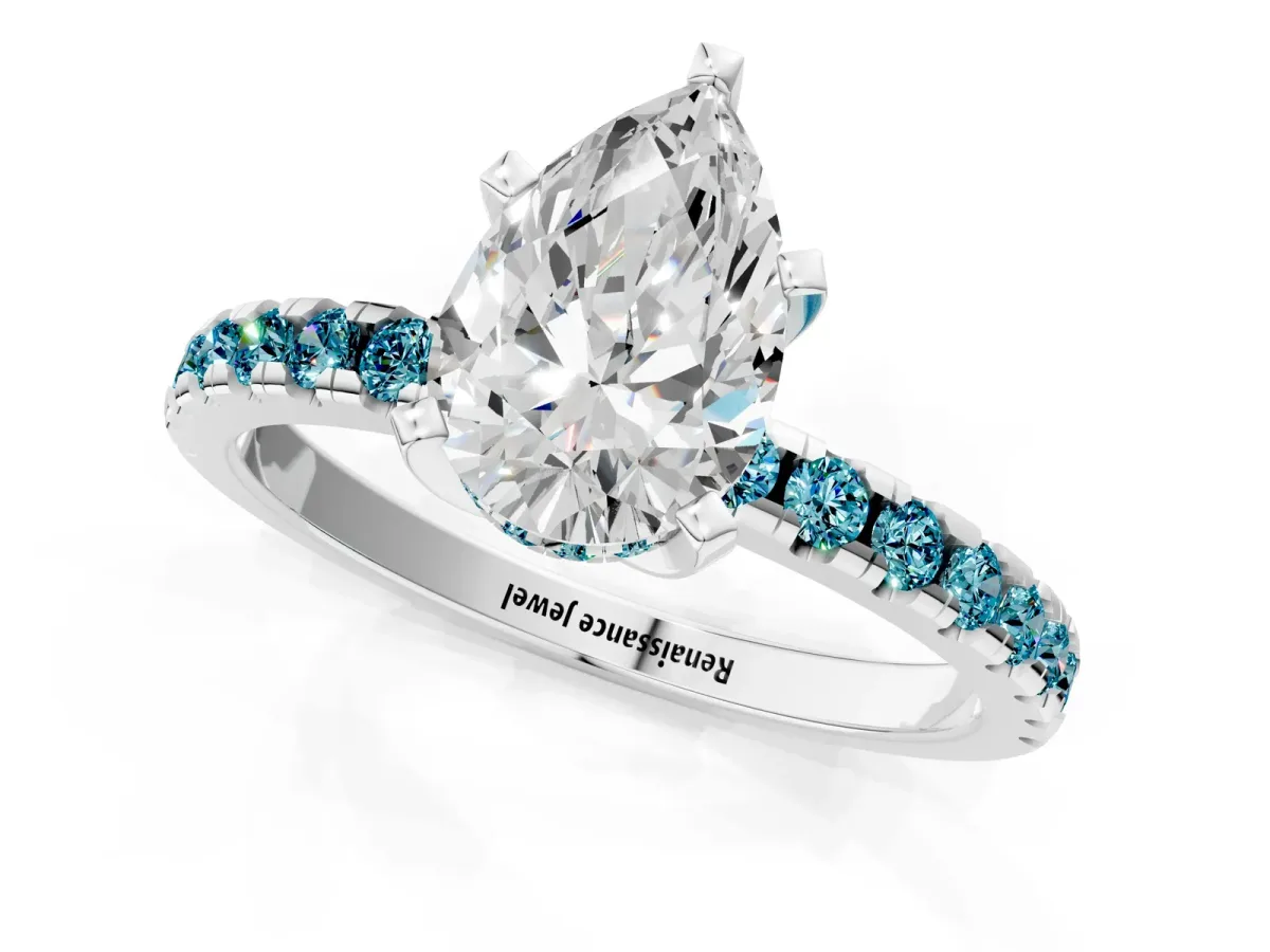 Pear Cut Diamond Solitaire Ring with Round Blue Topaz Pavé Band and Four-Prong Setting Silver