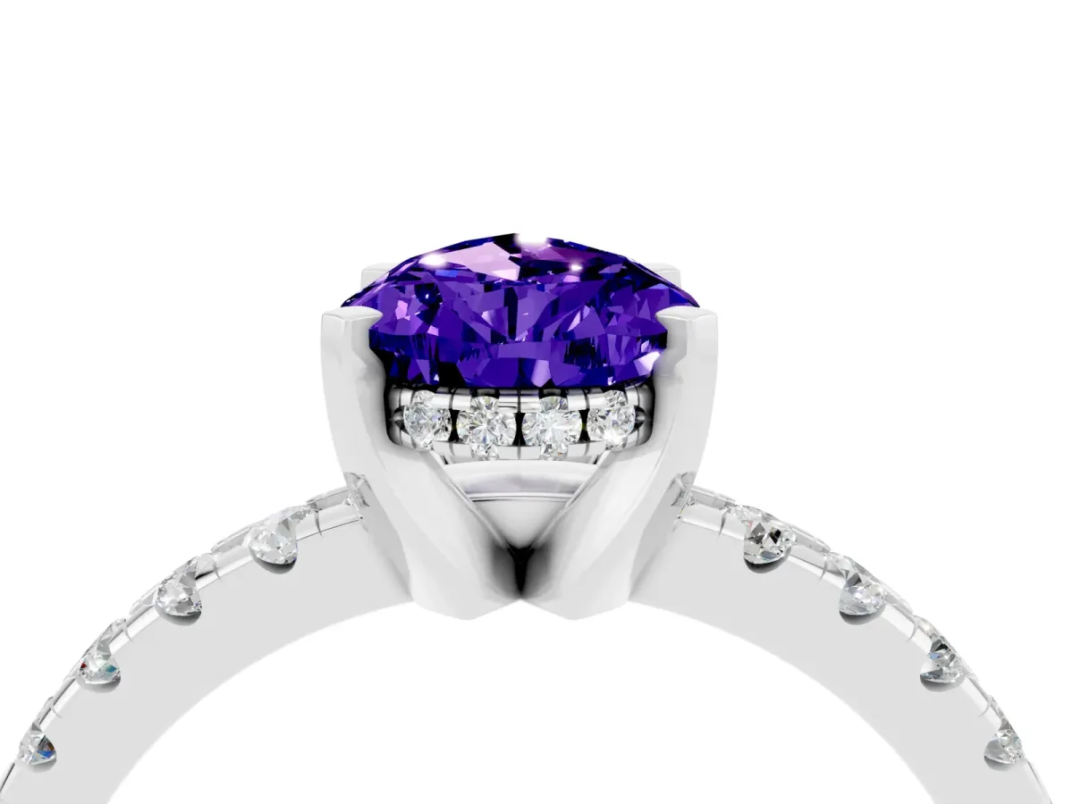 Pear Cut Tanzanite Solitaire Ring with Round Pavé Band and Four-Prong Setting Silver