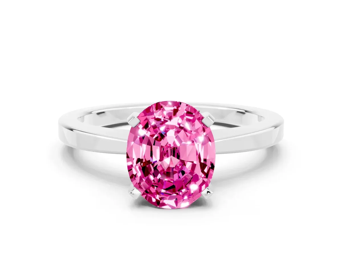 Oval Cut Pink Sapphire Solitaire Engagement Ring with Classic Band and Four-Prong Setting Silver