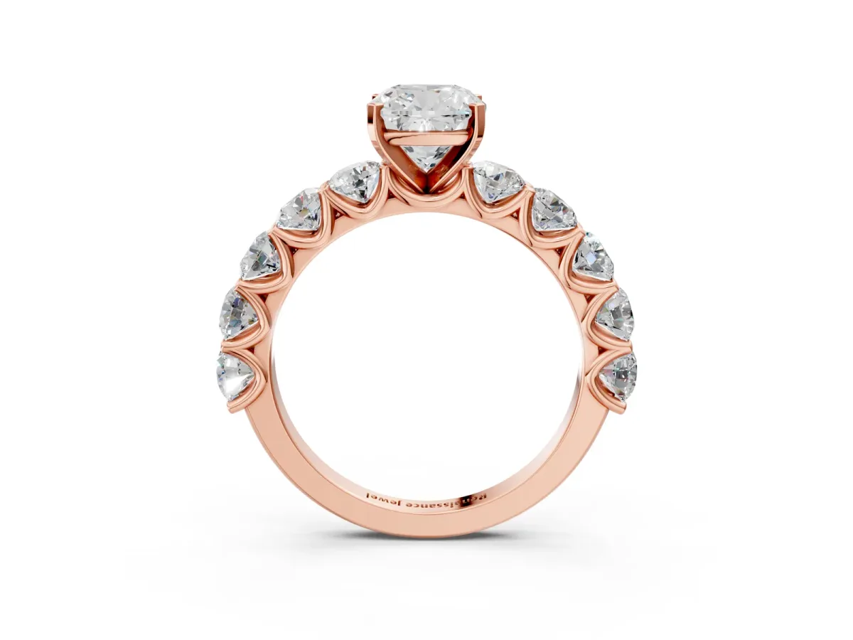 Cushion Cut Diamond Prong Setting with Side Stones on a Pave Band Rose gold