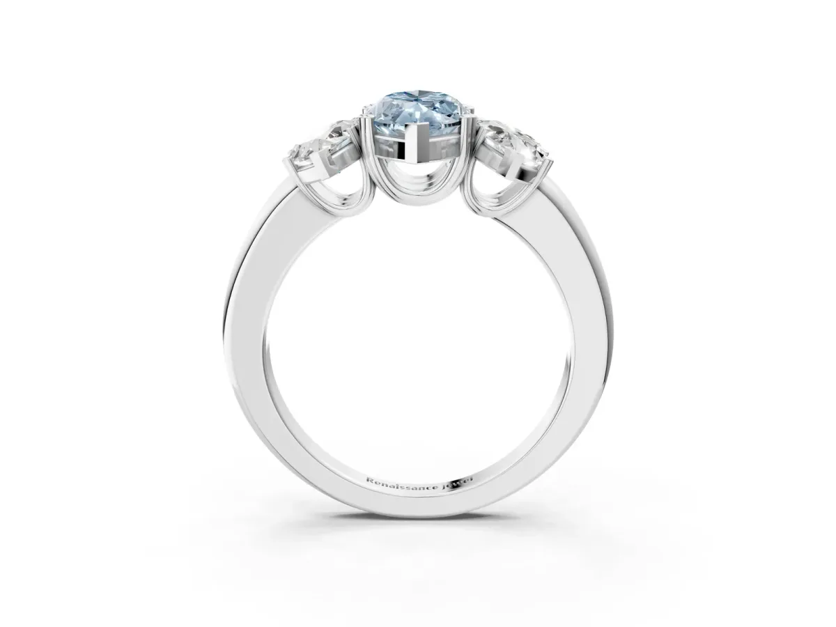 Fancy Blue Three-Stone Marquise Cut Cut Diamond Ring with Channel Set Band and Four-Prong Setting Platinum
