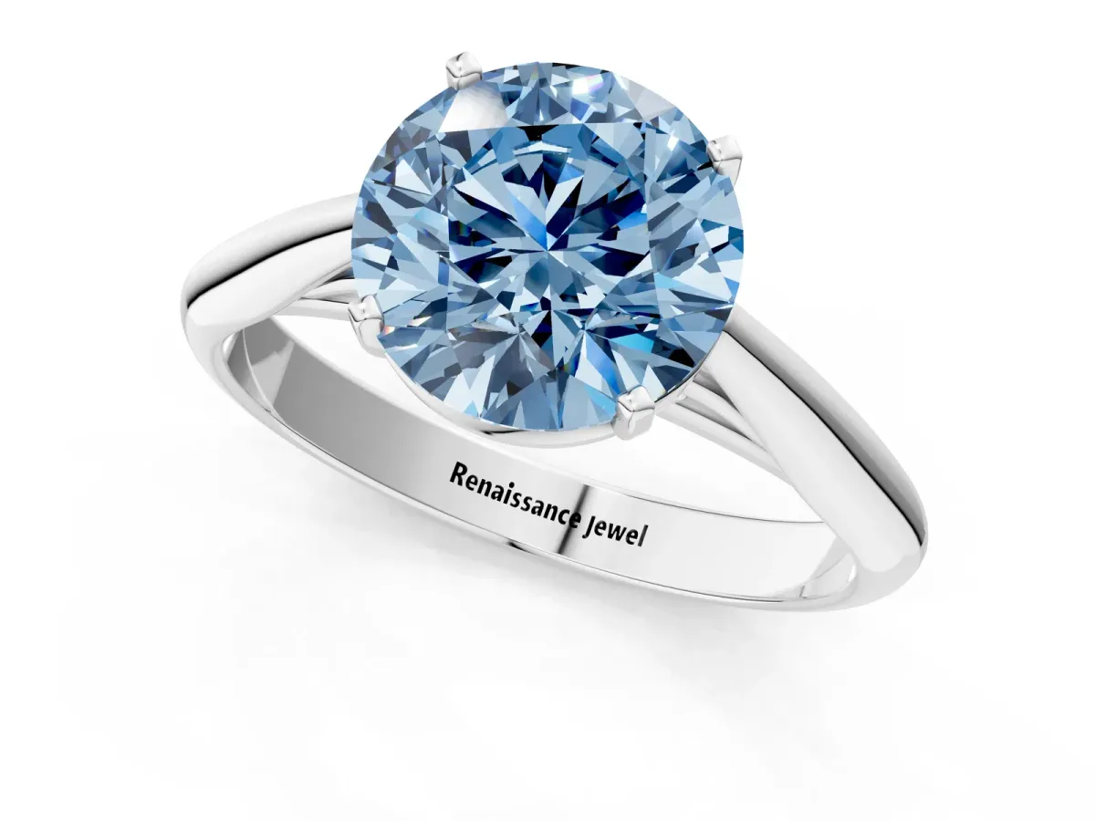 Fancy Blue Round Cut Diamond Solitaire Engagement Ring with Cathedral Setting and Four-Prong Mount White gold