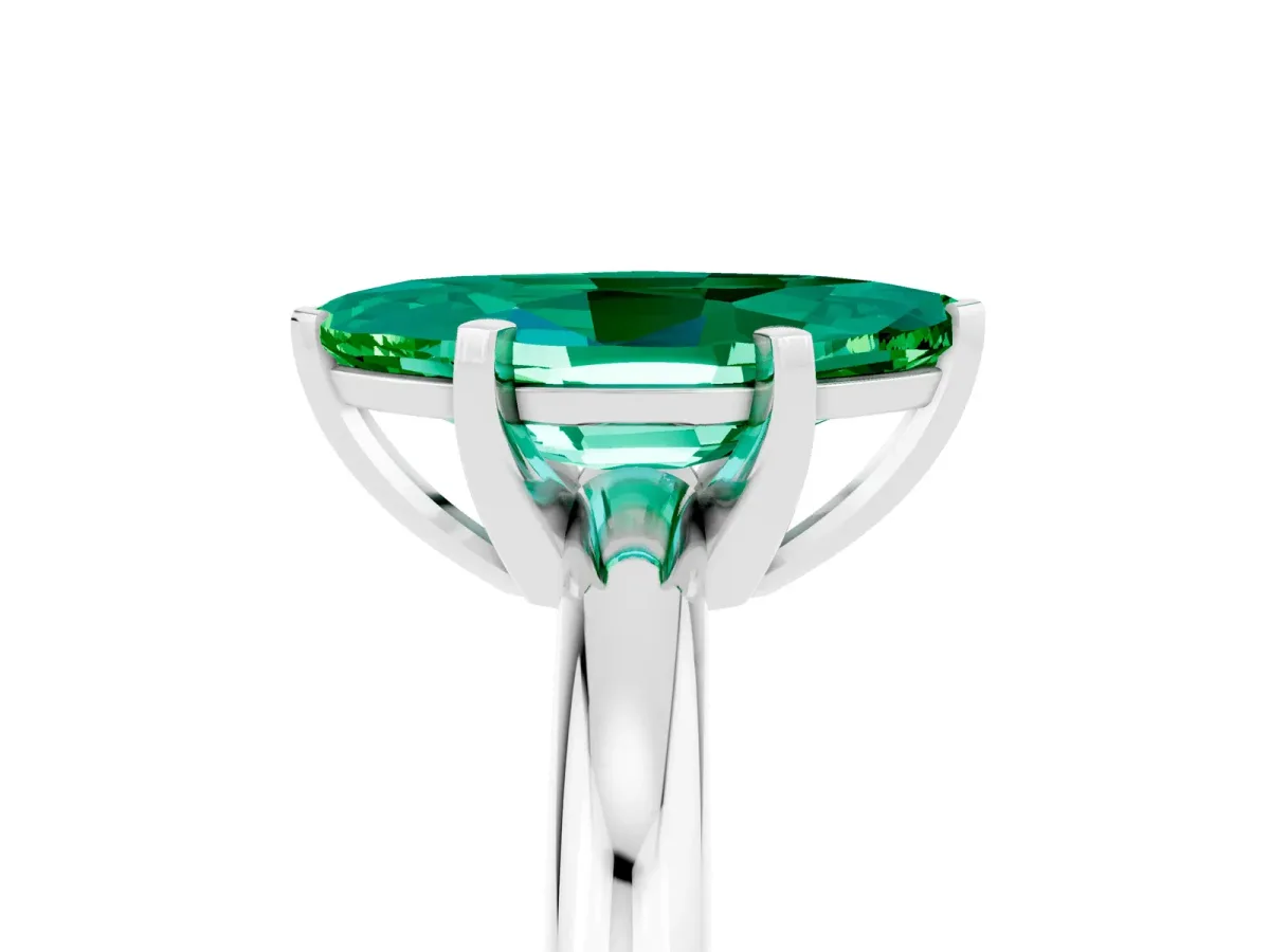 Marquise Cut Emerald Solitaire Engagement Ring with Round Band and Four-Prong Setting Silver
