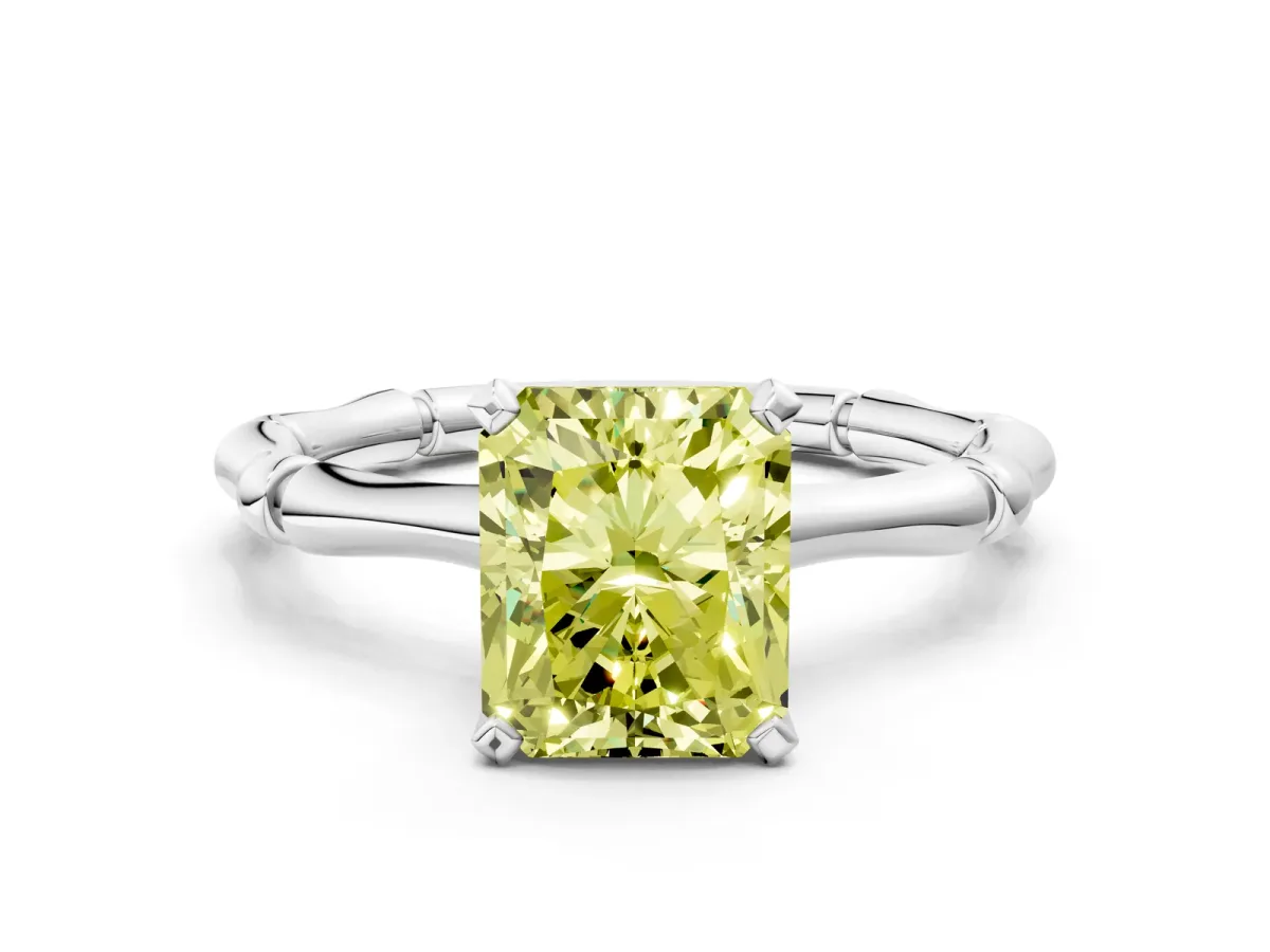 Fancy Yellow Radiant Cut Solitaire Diamond Ring with Bamboo Band and Four-Prong Setting Platinum