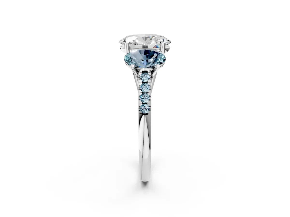 Three-Stone Oval Cut Diamond Ring with Round Aquamarine Pavé Band and Prong Setting Silver