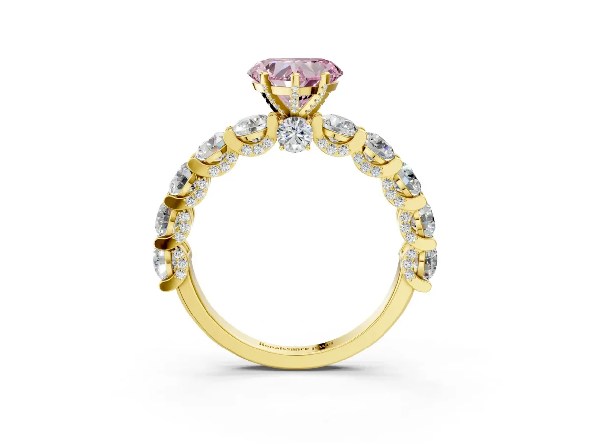 Fancy Pink Heart Cut Diamond Side Stone Engagement Ring with Four-Prong Setting Yellow gold