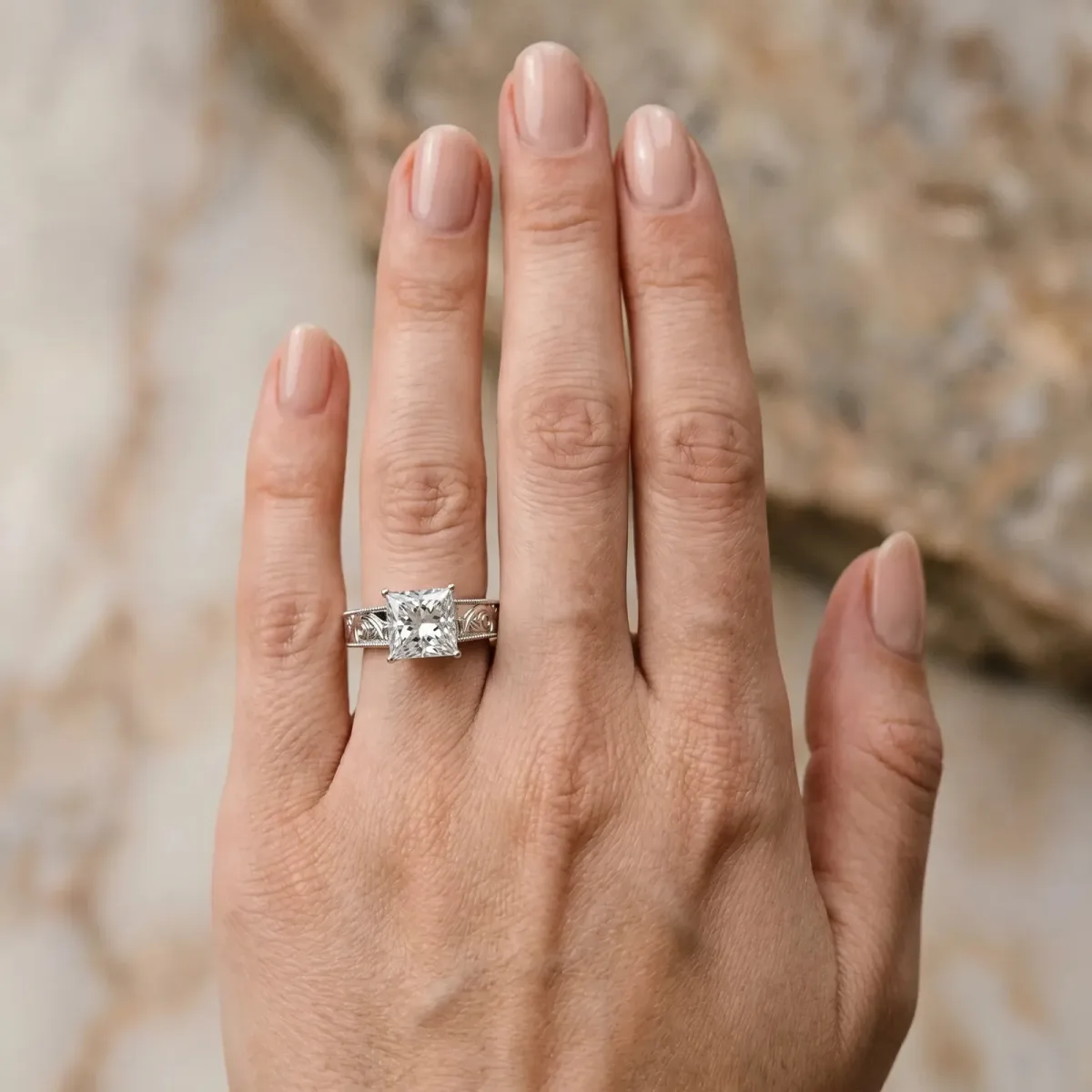 Princess Cut Diamond Solitaire Ring with Engraved Band and Four-Prong Setting White gold