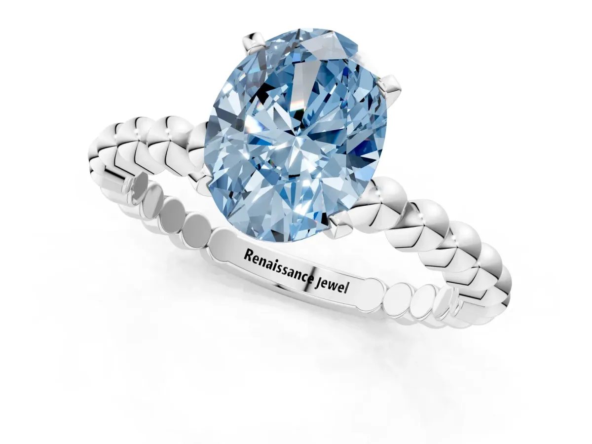 Fancy Blue Oval Cut Diamond Solitaire Ring with Beaded Band and Prong Setting Silver