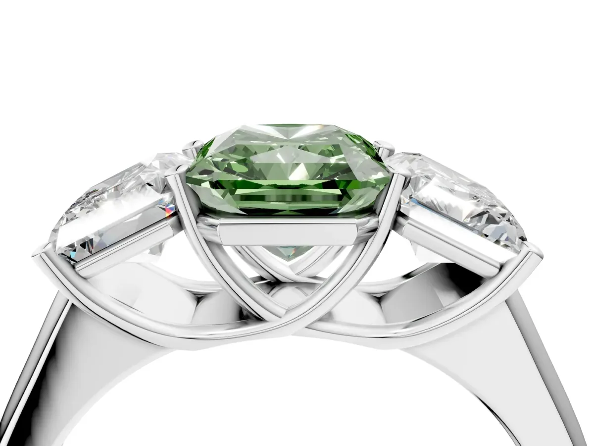 Fancy Green Radiant Cut Three-Stone Diamond Ring with Prong Setting on a Classic Band Platinum