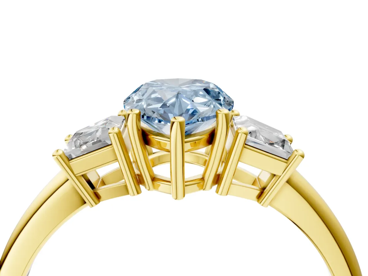 Fancy Blue Pear Cut Diamond Three-Stone Ring with Trapezoid Side Stones and Prong Setting Yellow gold