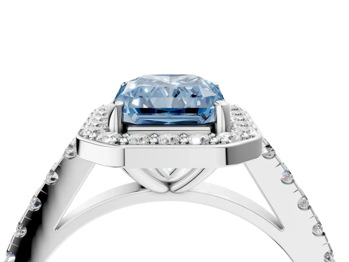 Fancy Blue Radiant Cut Diamond Halo Ring with Round Pavé Split Shank and Prong Setting Platinum
