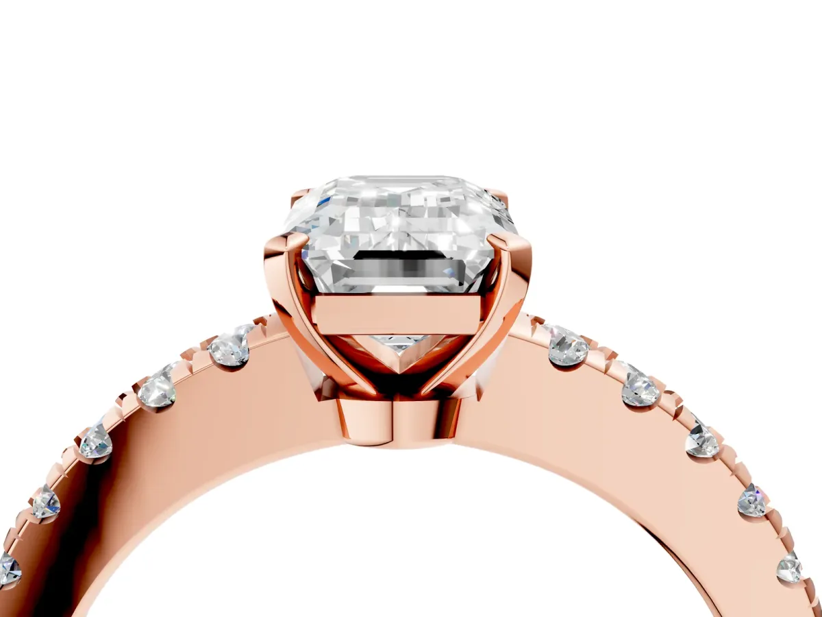 Emerald Cut Solitaire Diamond with Pavé Band and Four-Prong Setting Rose gold