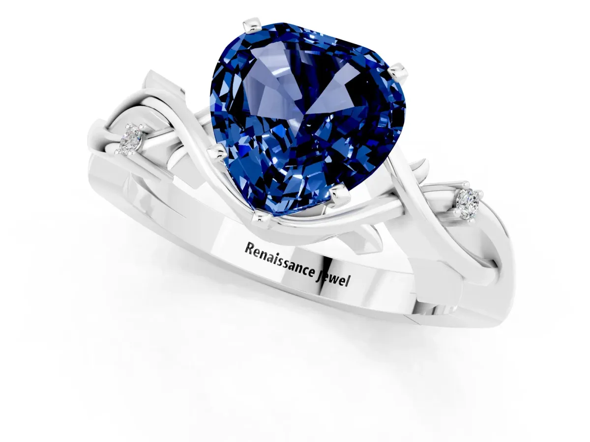 Heart Cut Blue Sapphire Solitaire Ring with Twisted Band and Prong Setting Silver