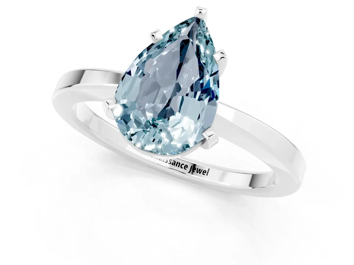 Pear Cut Aquamarine Solitaire Engagement Ring with Classic Band and Four-Prong Setting Silver