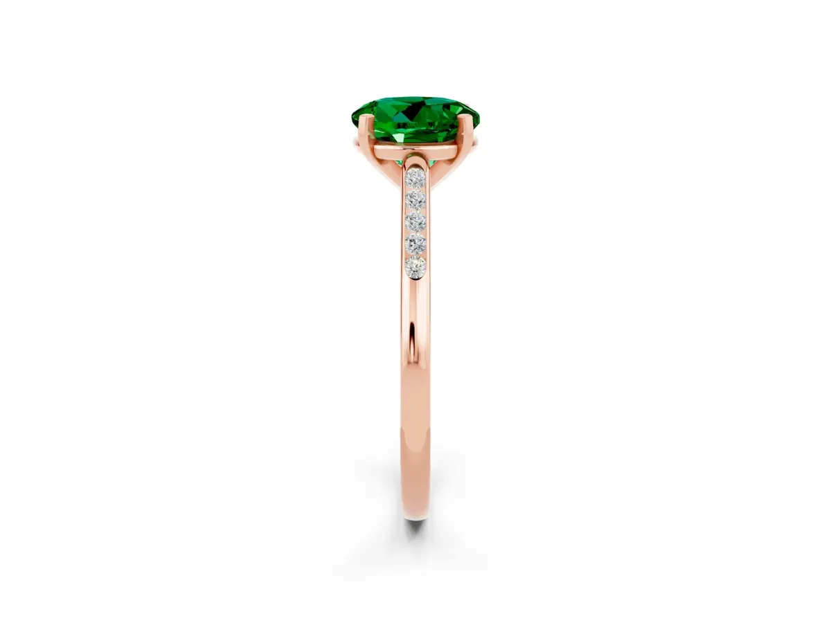 Round Cut Emerald Solitaire Ring with Channel Set Round Band and Prong Setting Rose gold