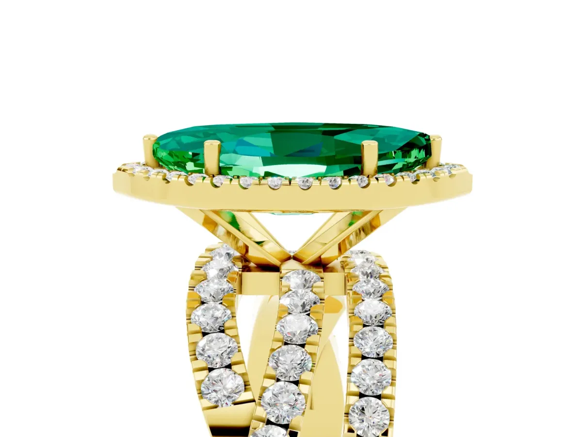 Marquise Cut Emerald Halo Ring with Round Split Shank and Prong Setting Yellow gold