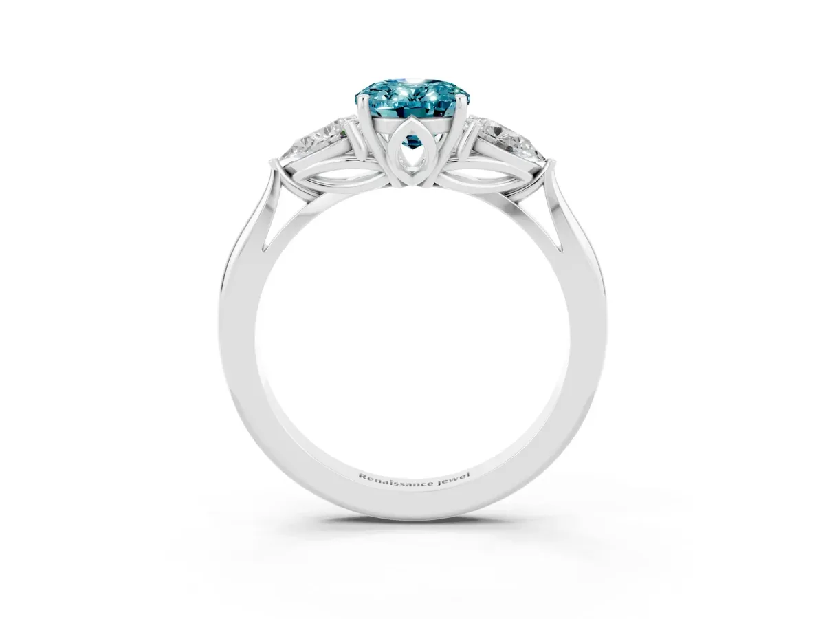 Three-Stone Oval Cut Blue Topaz Ring with Pear Side Stones in Four-Prong Setting White gold