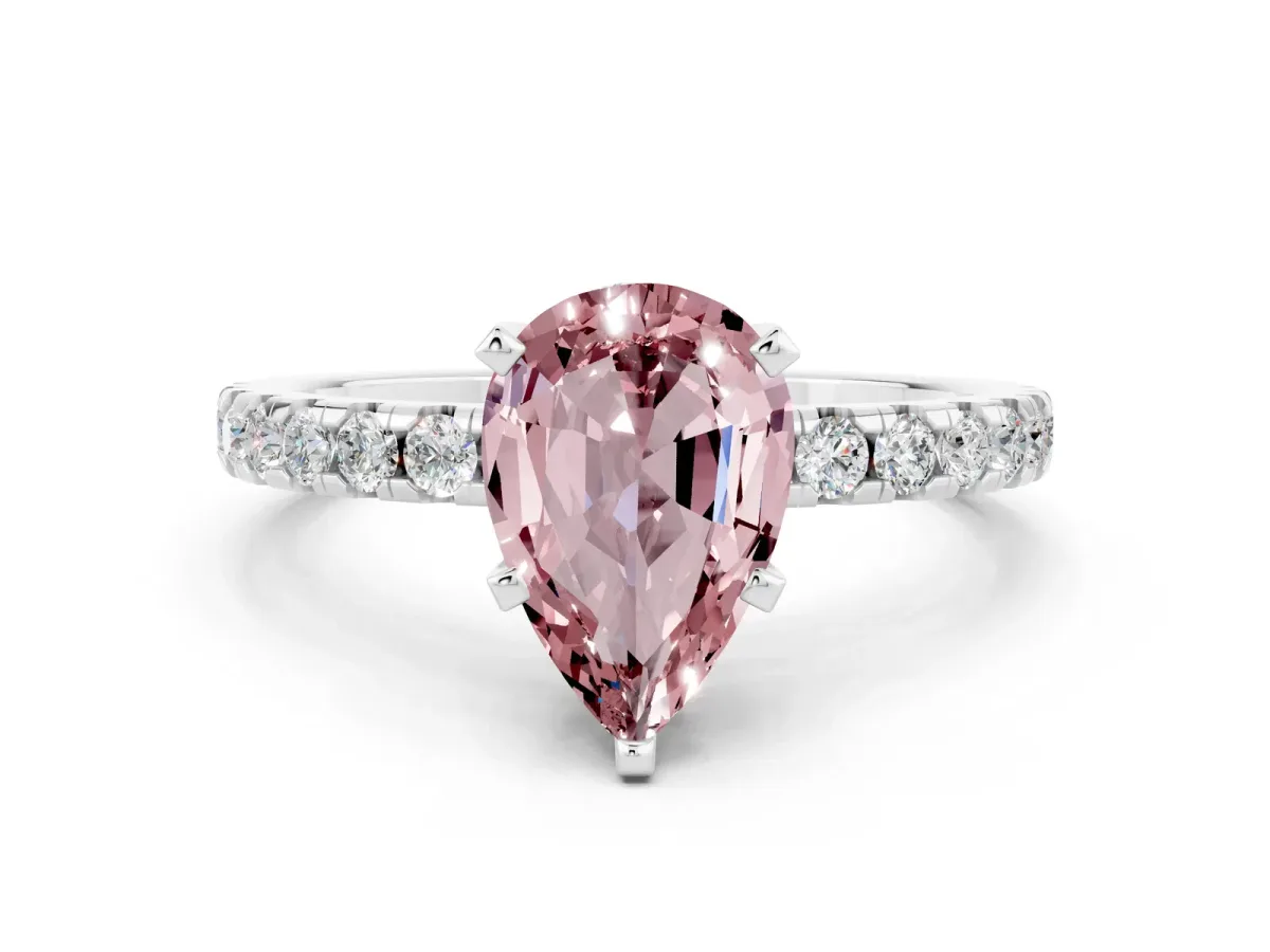 Pear Cut Morganite Solitaire Ring with Round Pavé Band and Four-Prong Setting Silver