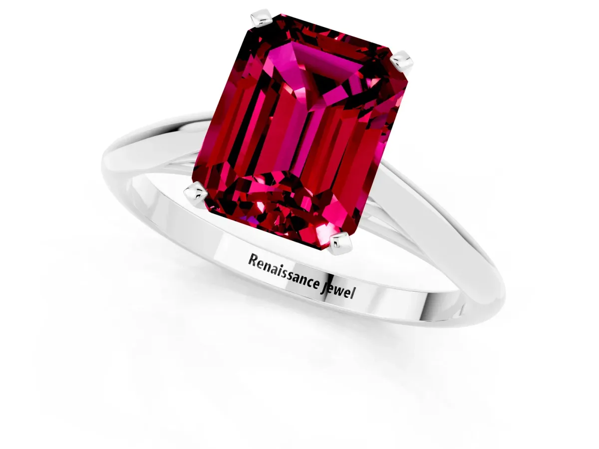 Emerald Cut Garnet Solitaire Engagement Ring with Cathedral Setting and Four-Prong Mount White gold
