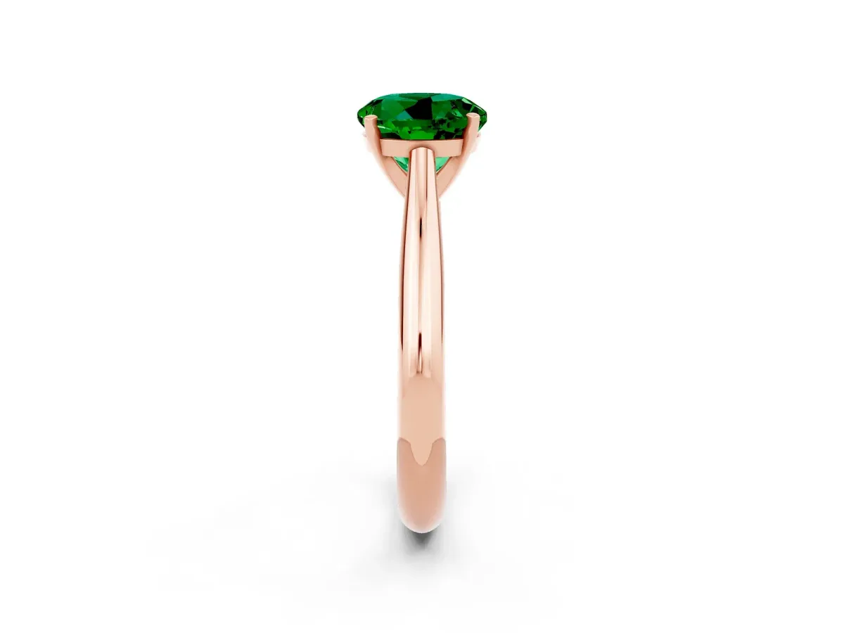Round Cut Emerald Solitaire Engagement Ring with Cathedral Setting and Four-Prong Mount Rose gold