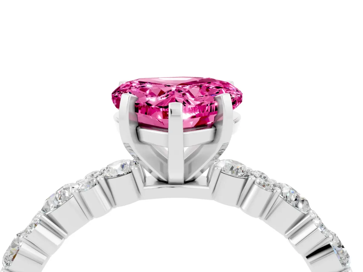Heart Cut Pink Sapphire Side Stone Solitaire Ring with Round and Four-Prong Setting Platinum